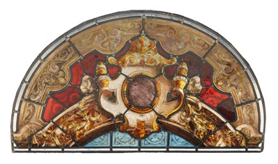 Lot 778 - An Irish stained and leaded glass overdoor