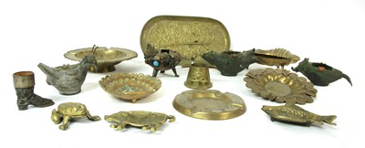 Lot 81 - A collection of brass ashtrays vestas and match sleeves