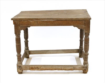 Lot 595 - An oak altar table