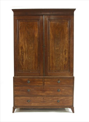 Lot 609 - A George III mahogany linen press