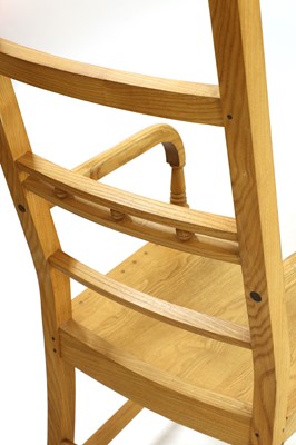Lot 282 - A modern beechwood high back East Anglian elbow chair