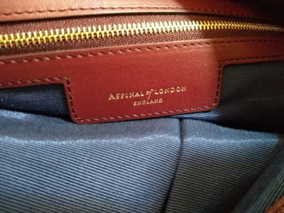 Lot 277 - An Aspinal of London burgundy hobo bag
