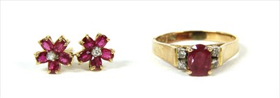 Lot 29 - A gold ruby and diamond ring