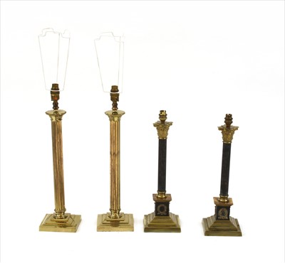 Lot 386 - A pair of Corinthian column brass and ebonised table lamps