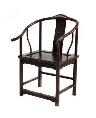 Lot 113 - A Chinese hardwood armchair