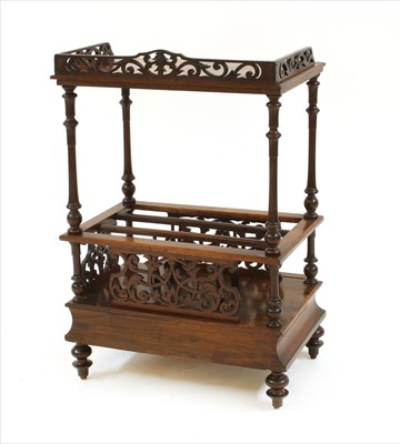 Lot 483 - A Victorian figured walnut canterbury whatnot