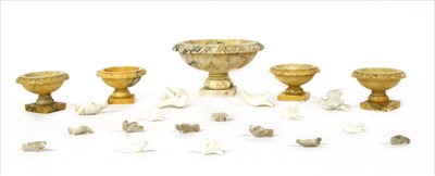 Lot 233 - A set of four Grand Tour miniature urns