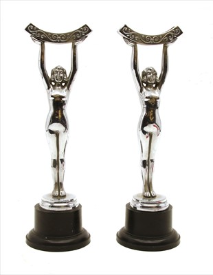 Lot 243 - A pair of Art Deco female mirror stands