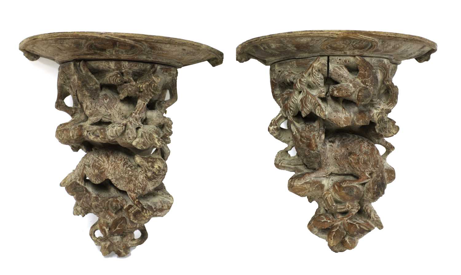 Lot 249 - A pair of Black Forest carved wall brackets