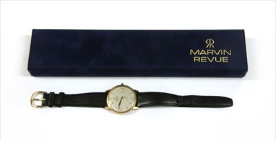 Lot 119 - A 9ct gold Marvin Revue quartz strap watch