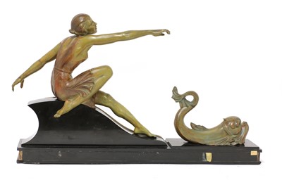 Lot 327 - An Art Deco patinated spelter centrepiece of a lady