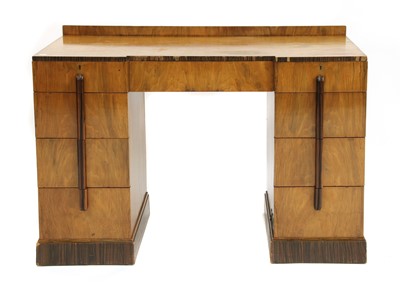 Lot 354 - An Art Deco walnut and simulated coromandel dressing table