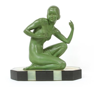 Lot 352 - An Art Deco patinated spelter figure of a girl