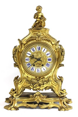 Lot 510 - A French ormolu mantel clock
