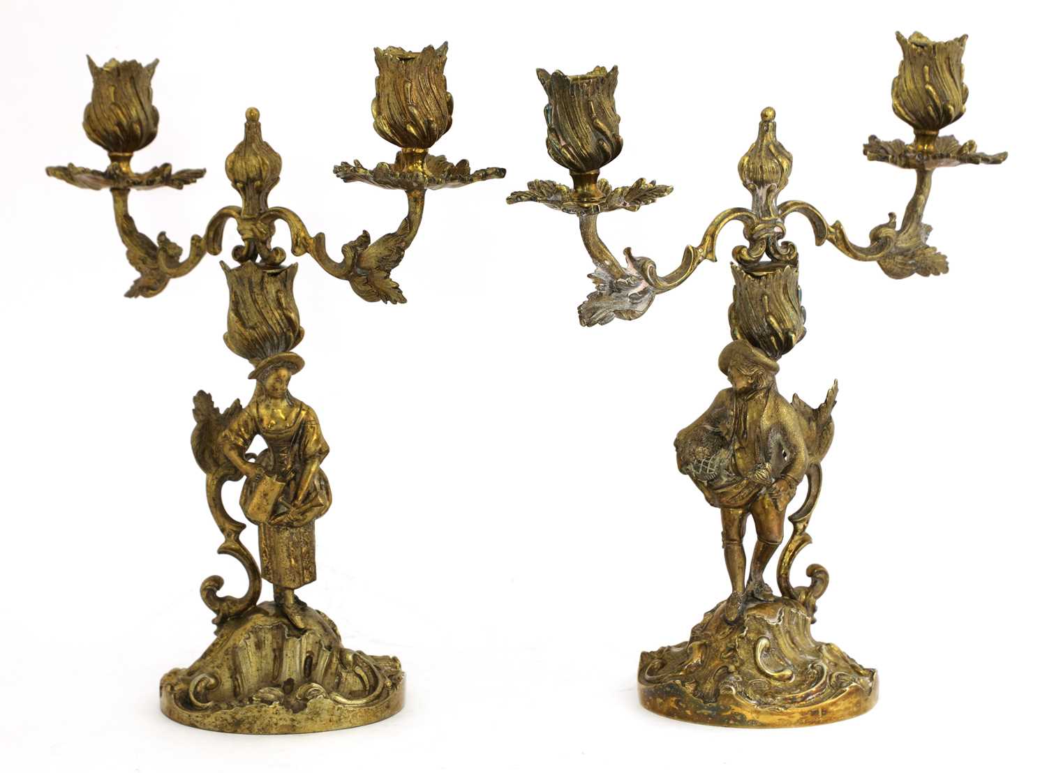 Lot 5 - A pair of Elizabeth II silver gilt figural candelabra
