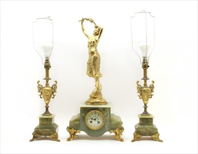 Lot 504 - An ormolu mounted green onyx clock