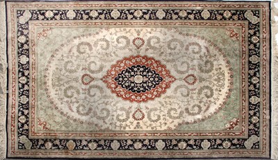 Lot 586 - A Persian wool and silk Isfahan carpet