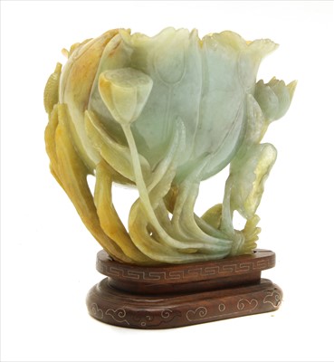Lot 283 - A Chinese carved jadeite lotus vase