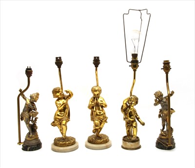 Lot 339 - A pair of gilt bronze cherub table lamps