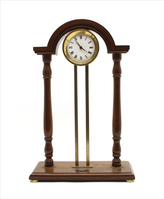 Lot 442 - A 20th century mahogany and gilt brass mystery clock