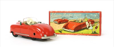 Lot 190 - A Schuco Radio 4012 red clockwork car