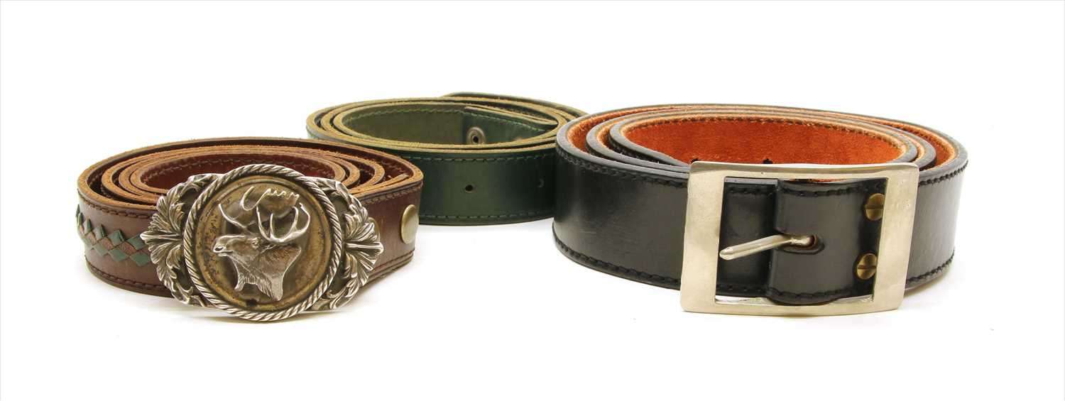 Lot 1146 - Three gentleman's leather belts, one with detachable silver moose head buckle