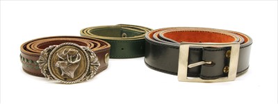 Lot 1146 - Three gentleman's leather belts, one with detachable silver moose head buckle