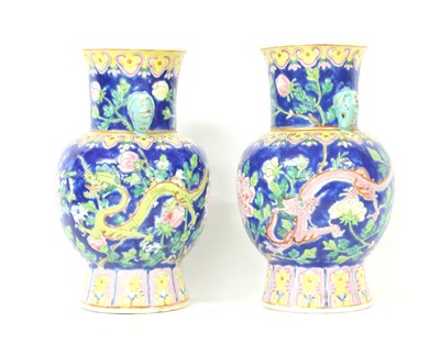 Lot 119 - A pair of Chinese famille rose vases
