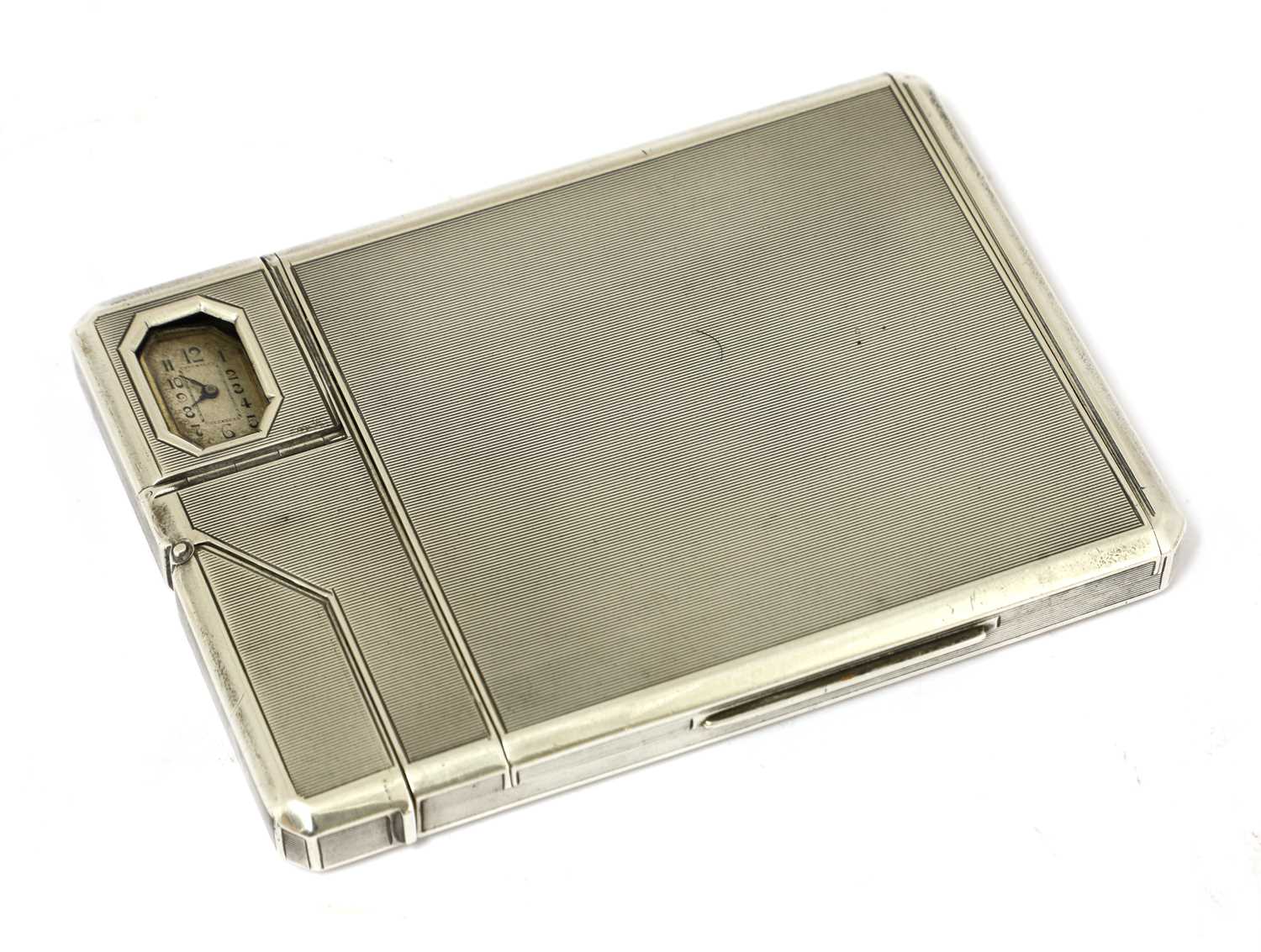 Lot 74 - A rare silver combination cigarette case