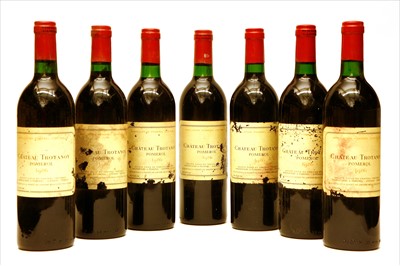 Lot 180 - Château Trotanoy, Pomerol, 1986, seven bottles (in opened owc)