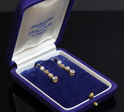 Lot 89 - A pair of early 20th century Continental gold, pearl and diamond drop earrings