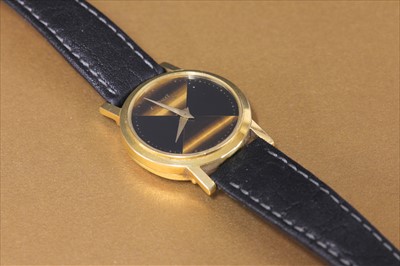 Lot 360 - A ladies' 18ct gold Piaget quartz strap watch