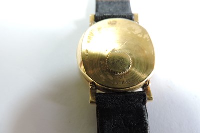 Lot 360 - A ladies' 18ct gold Piaget quartz strap watch