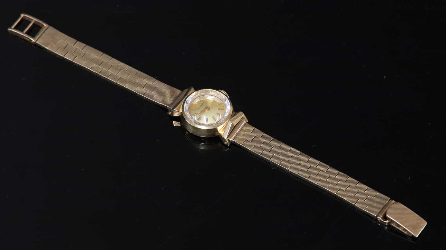Lot 350 - A ladies' 9ct gold Tissot mechanical watch, c.1950