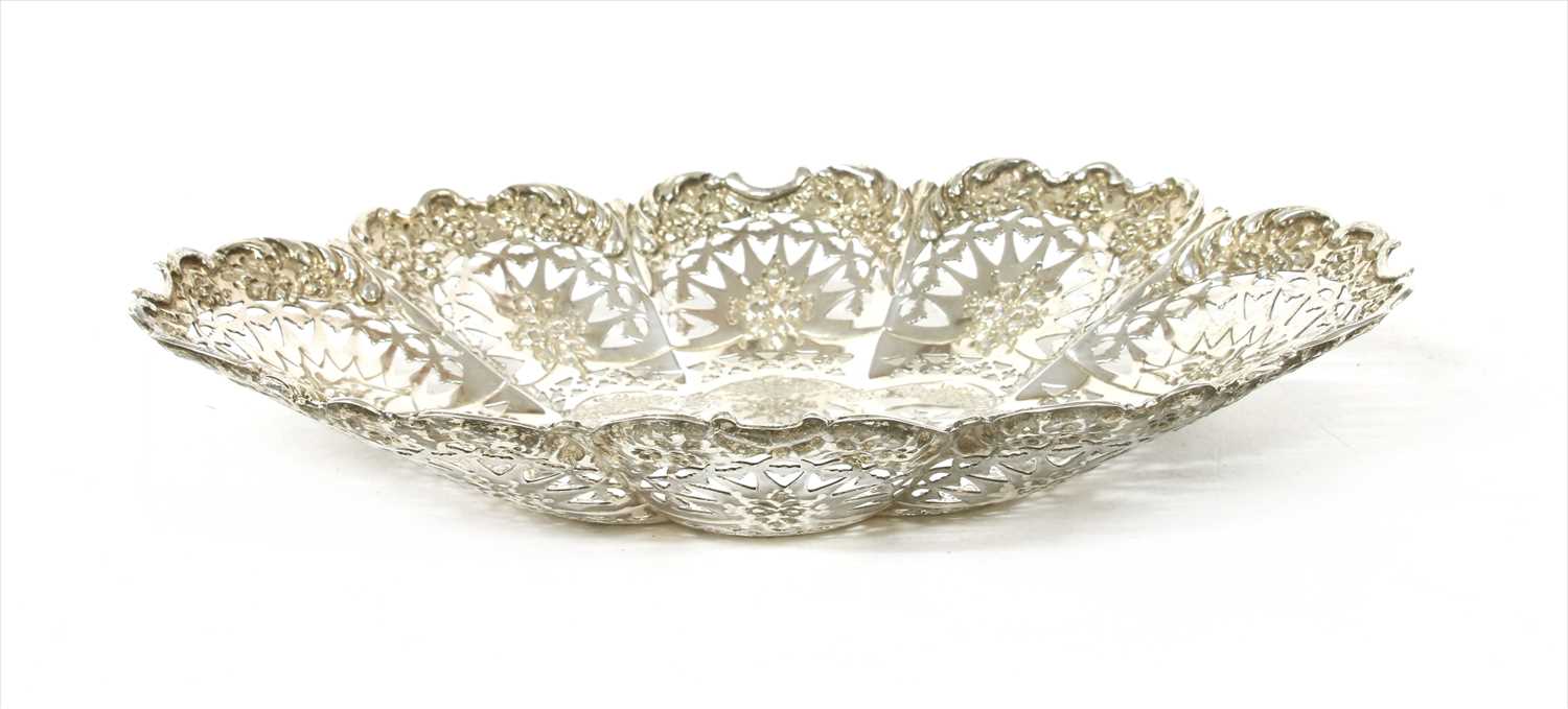 Lot 141 - A pierced and lobed silver dish