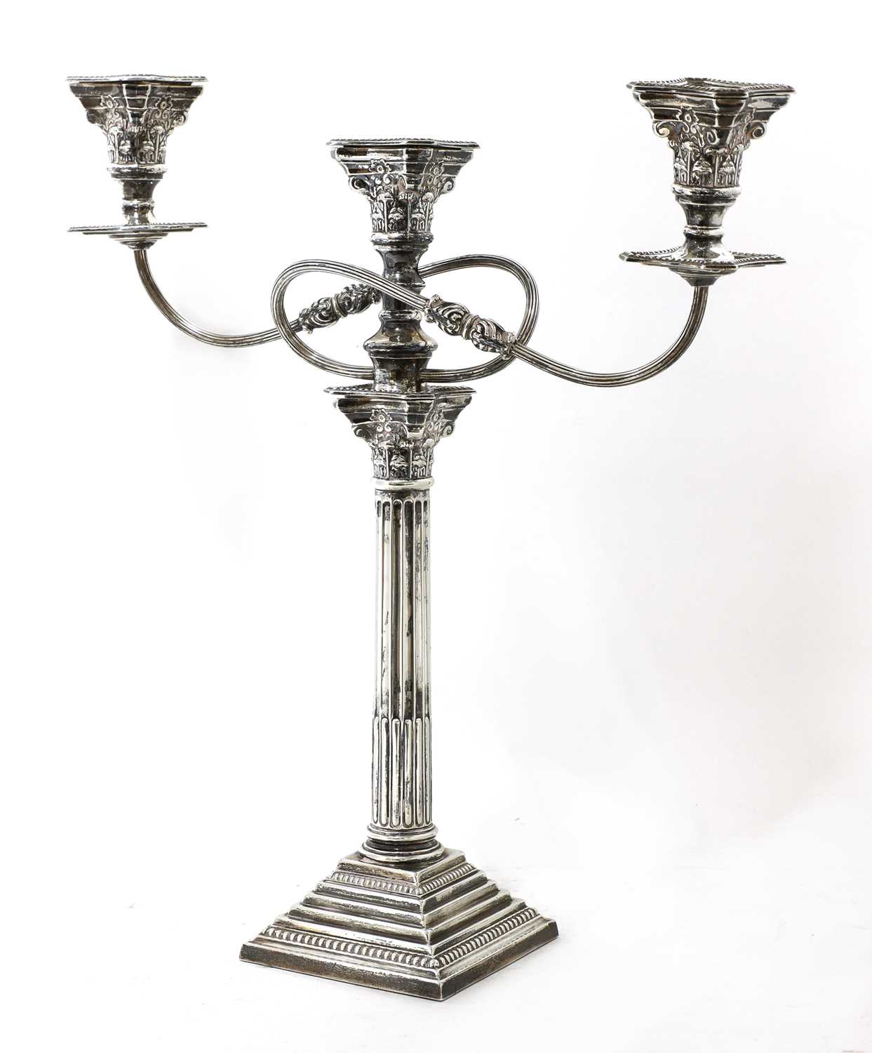 Lot 58 - A George V silver three-light Corinthian column candelabrum