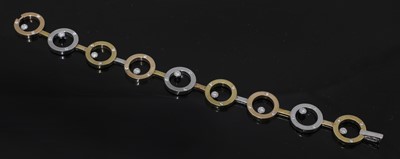 Lot 295 - A three colour gold diamond set flat section hoop link bracelet