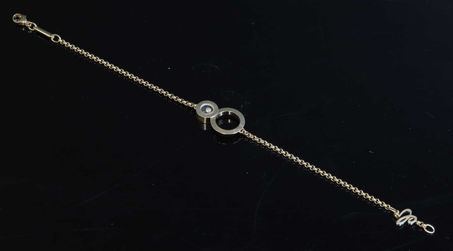 Lot 297 - An 18ct rose gold Chopard 'Happy 8' diamond set bracelet