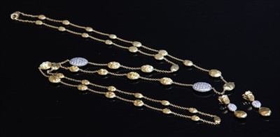 Lot 293 - A gold diamond set 'Siviglia' necklace and earring suite by Marco Bicego