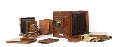 Lot 333 - Two Edwardian mahogany and brass bellows cameras