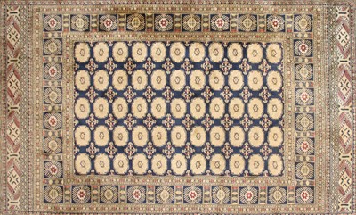 Lot 598 - A Middle Eastern blue ground carpet