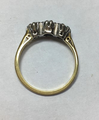 Lot 80 - A gold three stone diamond ring