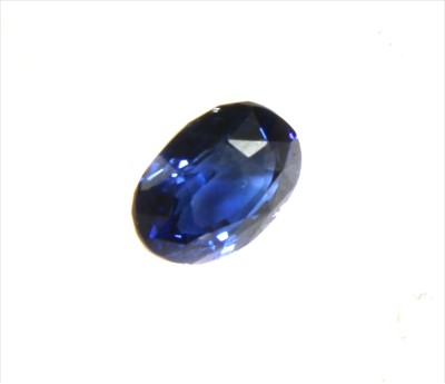 Lot 156 - An unmounted oval mixed cut sapphire