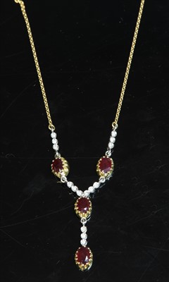 Lot 191 - An 18ct two colour gold ruby and diamond 'Y' necklace