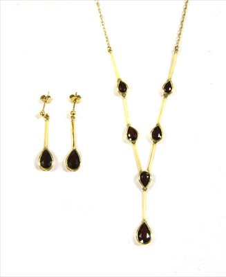 Lot 137 - An 18ct gold garnet 'Y' necklace and earrings suite