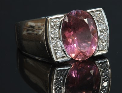 Lot 222 - A white gold pink tourmaline and diamond ring