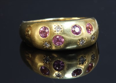Lot 217 - An 18ct gold pink sapphire and diamond Prussian-style ring