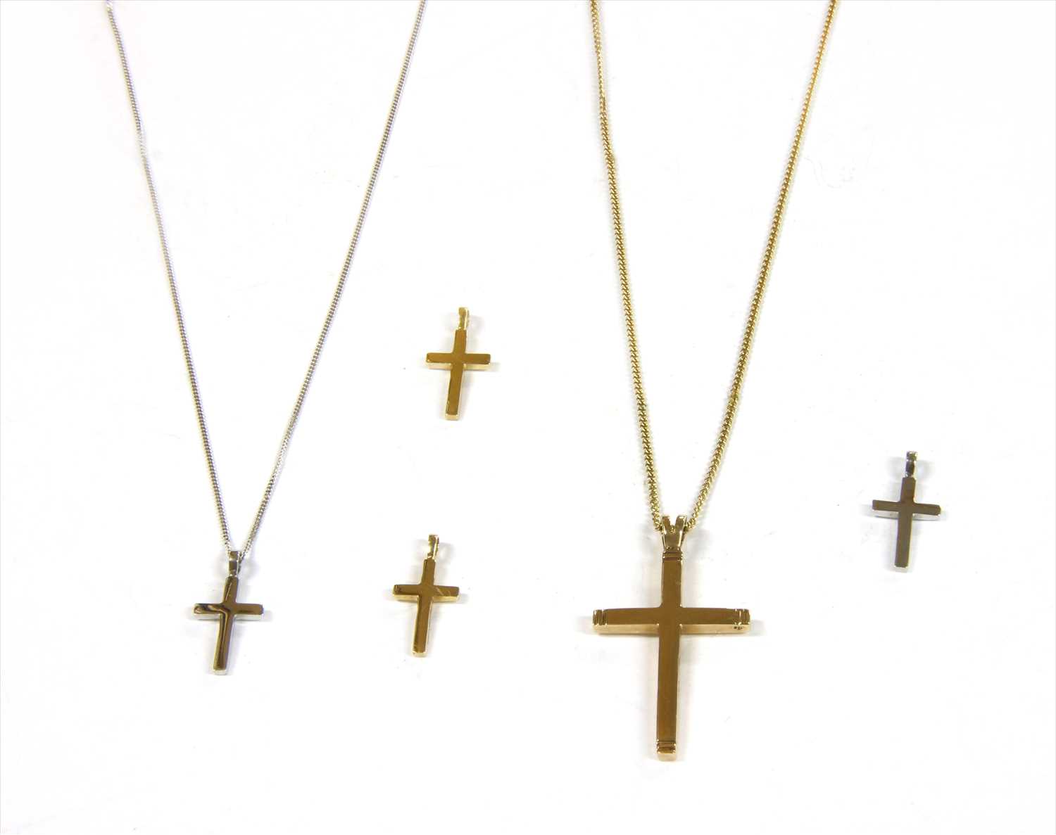 Lot 9 - A 9ct gold cross and chain