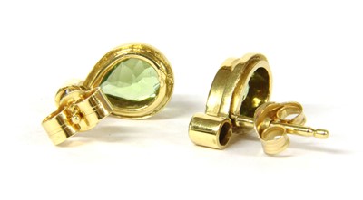 Lot 94 - A pair of 18ct gold peridot and diamond earrings
