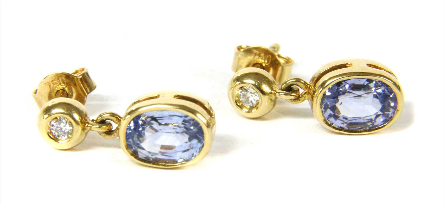 Lot 65 - A pair of 18ct gold sapphire and diamond earrings